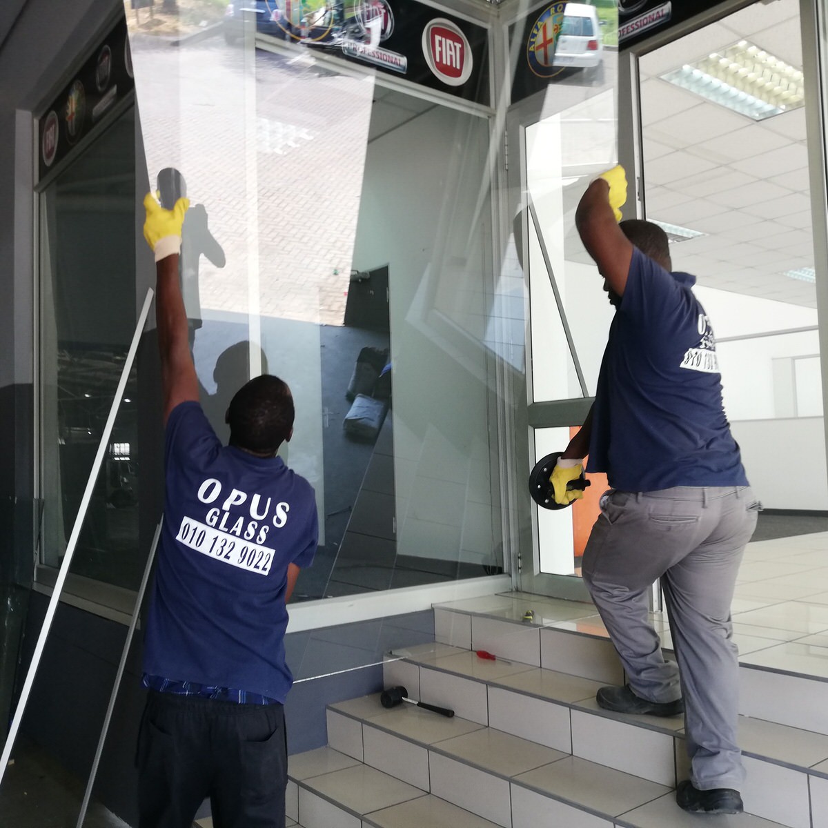 glass sheet installation team