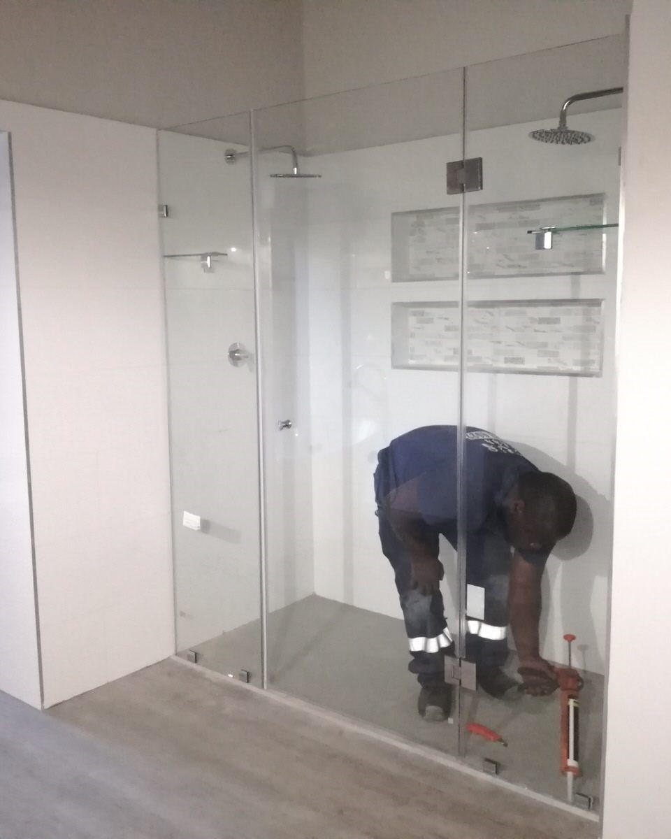 frameless shower enclosure installation