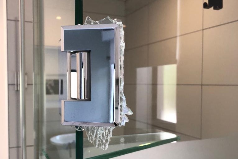 shower hinge with broken glass